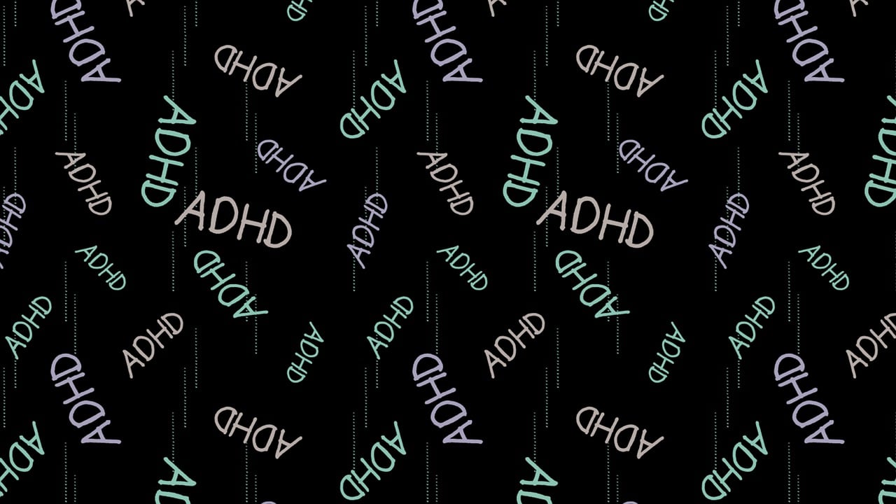 ADHD Treatment - the acronym ADHD typed multiple times over a black background