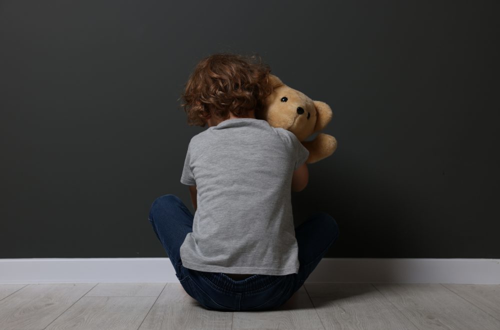 Child suffering from parental emotional neglect