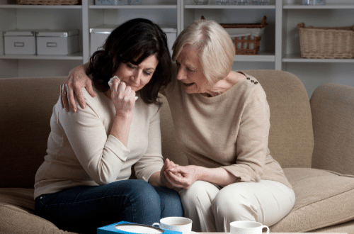 Two women coping with loss